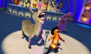 Donkey and Puss in Boots from Shrek, singing into a microphone