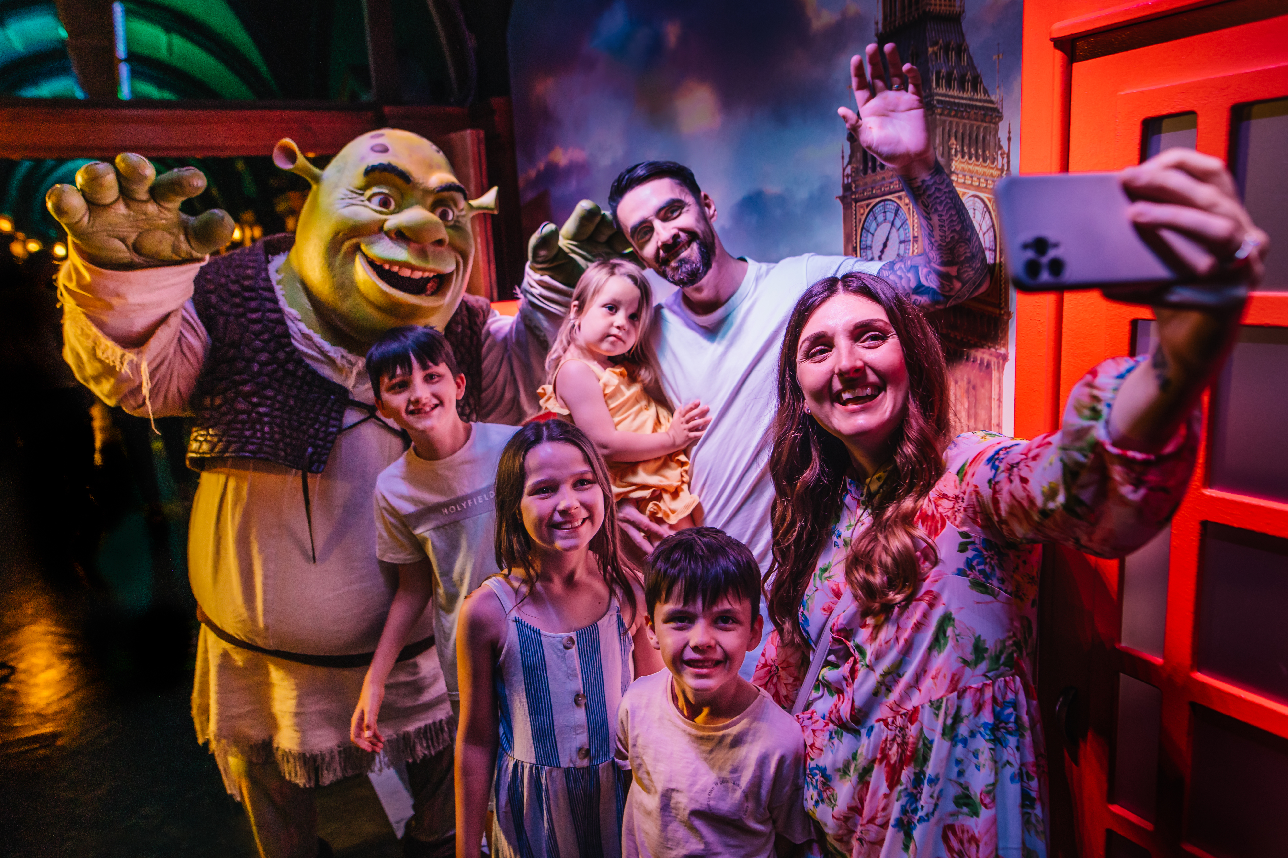 A family posing at Shrek’s Adventure! In London.