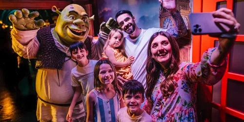 A family posing at Shrek’s Adventure! In London.